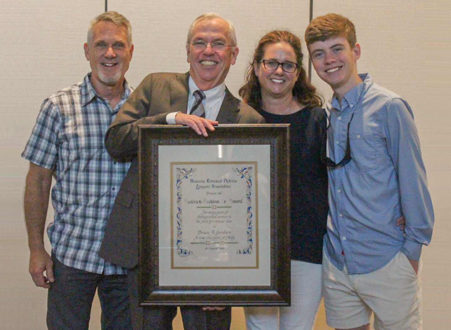 Bruce Gardner Receives ACDLA Beddow Award (w/Robin, Jackie and Jack)